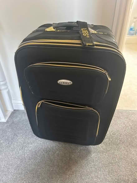 Photo of free Large suitcase (Sugar way) #1