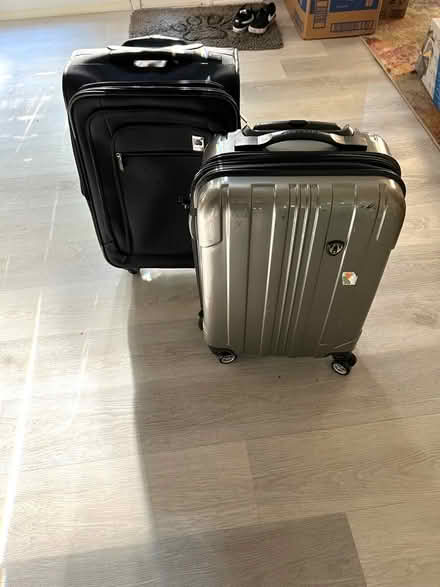 Photo of free Carryon size suitcases (2) (83rd & Mendingwall) #1