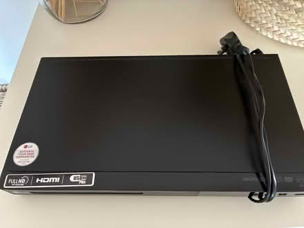 Photo of free DVD player + lots of dvds (Kew TW9) #2