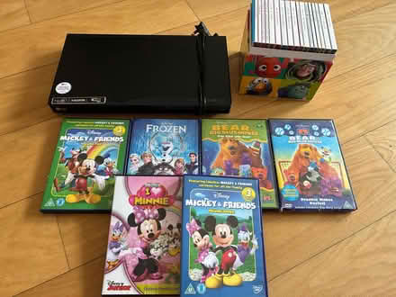 Photo of free DVD player + lots of dvds (Kew TW9) #1