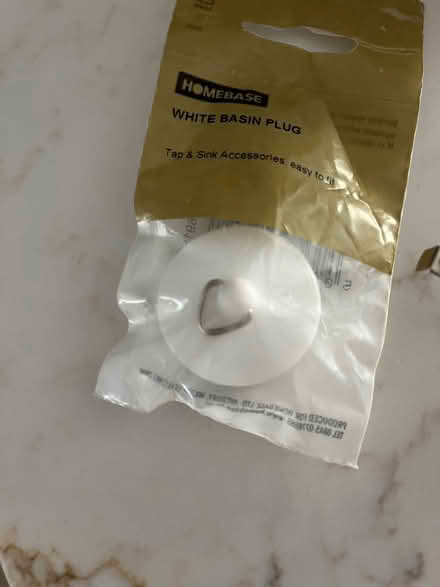 Photo of free Small white basin plug (NW8 St. John’s Wood) #1