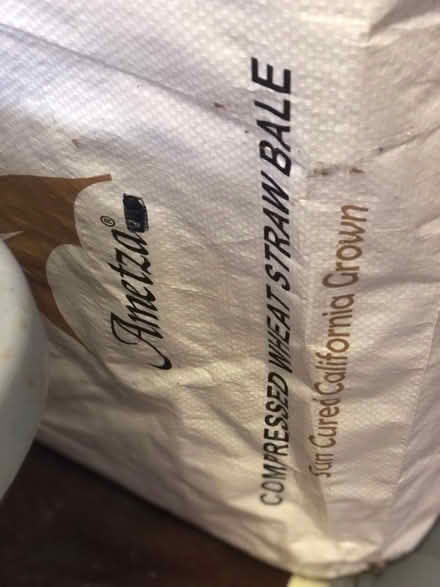 Photo of free Bale compressed straw for garden (East Watertown) #1