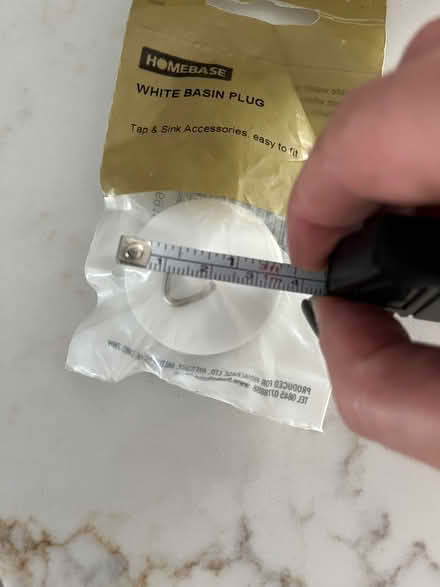 Photo of free Small white basin plug (NW8 St. John’s Wood) #2
