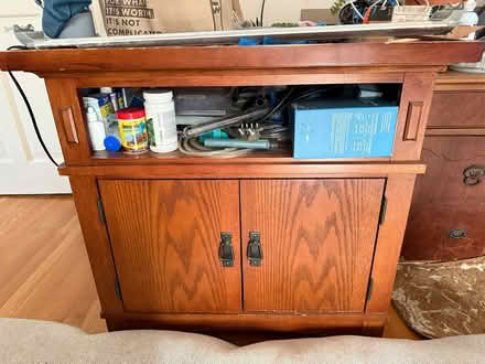 Photo of free Aquarium cabinet and misc supplies (Palfrey St, Whitney Hill) #1