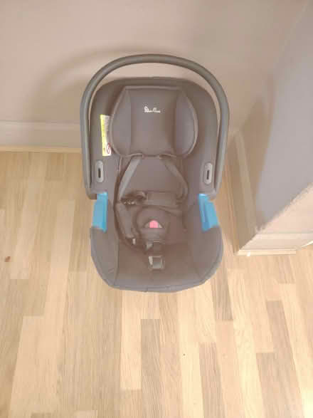 Photo of free Car seat sliver cross (Arlesey) #1