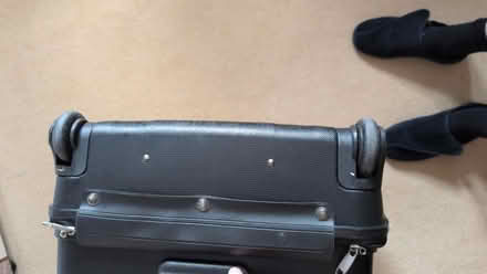 Photo of free 24in black hard suitcase (Holy Corner EH10) #3