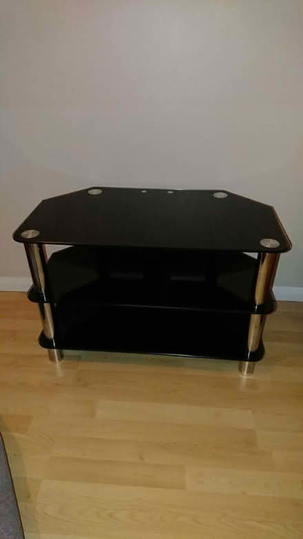 Photo of free Black glass tv unit (Upwell PE14) #1
