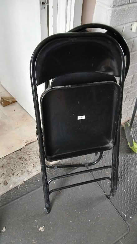 Photo of free 2 black folding metal chairs (Upton CH49) #1