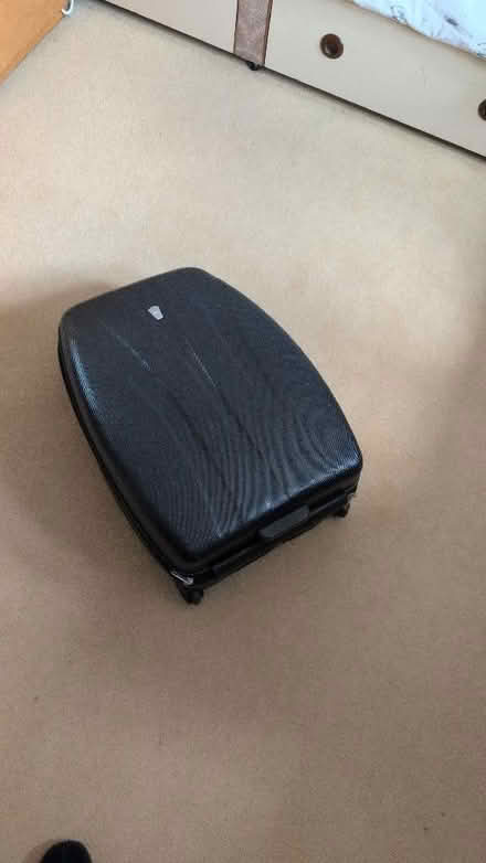 Photo of free 24in black hard suitcase (Holy Corner EH10) #1