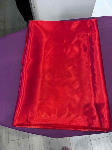 Photo of free Red shiny material (Leatherhead KT22) #1