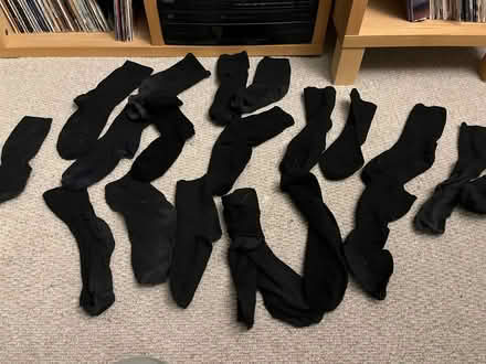 Photo of free Large quantity of odd socks and kids black ankle socks (Stroud GL5) #2