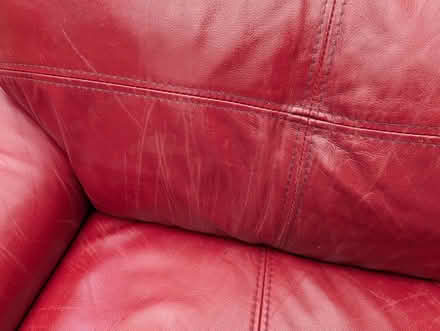 Photo of free Two seater leather sofa in red (North Woodchester GL5) #2