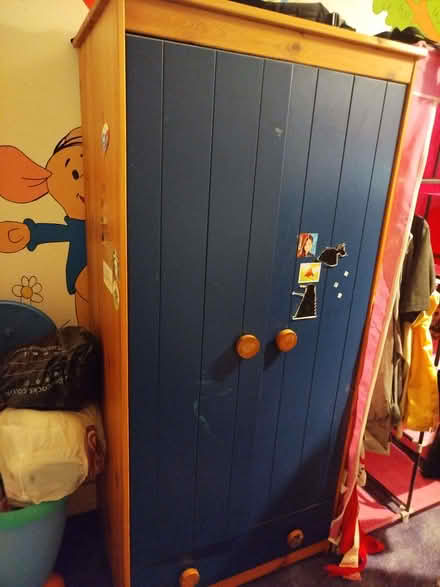 Photo of free Wardrobe, wood/blue, sturdy,Dr.Who stickers & some scratches (Puckeridge SG11) #1