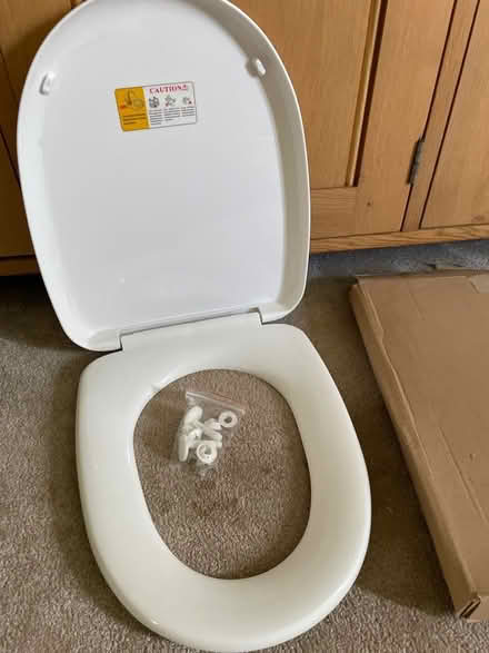Photo of free New plastic loo seat in box (West Stratton SO21) #1