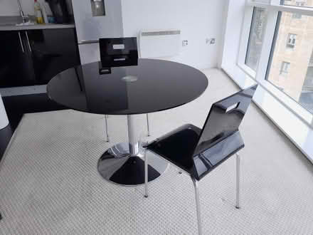 Photo of free Black glass table & 2 chairs (Sandylands morecambe LA3) #1