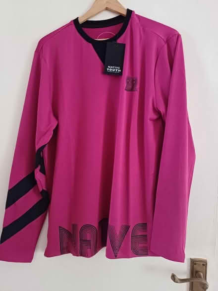 Photo of free 4 new sports tops in men's Small (Malvern Link WR14) #1