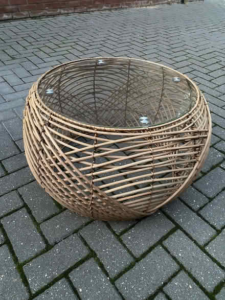 Photo of free Round glass topped wicker coffee table (Horkesley Heath CO4) #1