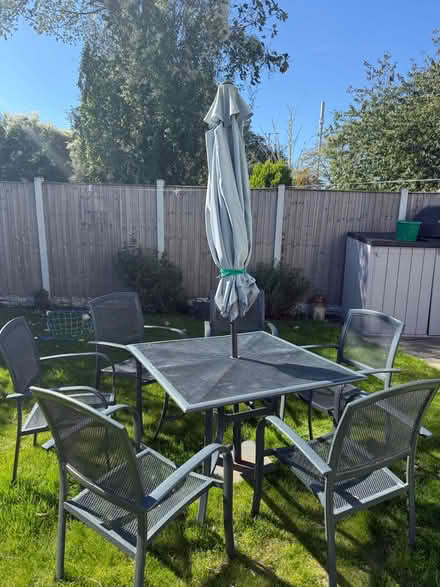 Photo of free Grey outdoor table and chairs (L23) #1