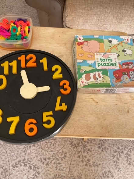 Photo of free Jigsaw clock and puzzle and tub of magnetic letters (Dursley GL11) #1