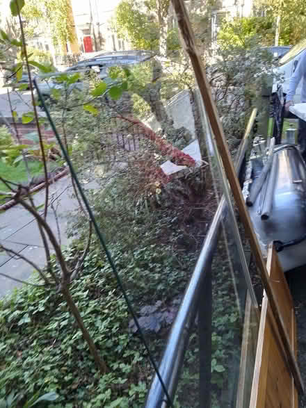 Photo of free Steel bath, wooden panelled bath panel, glass over bath show (Birkby HD2) #1