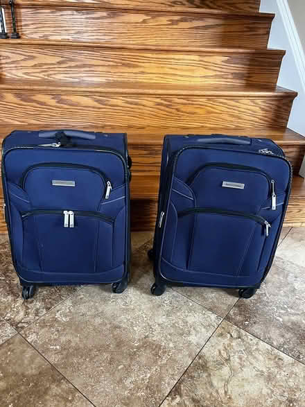 Photo of free 2 Matching Roll-Aboard Suitcases (Gainesville Va.) #1
