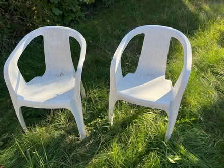 Photo of free 2 white plastic garden chairs (Upper Wolvercote OX2) #1