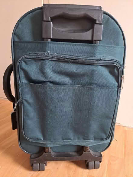 Photo of free Rather battered small wheeled suitcase (Seaside BN22) #3