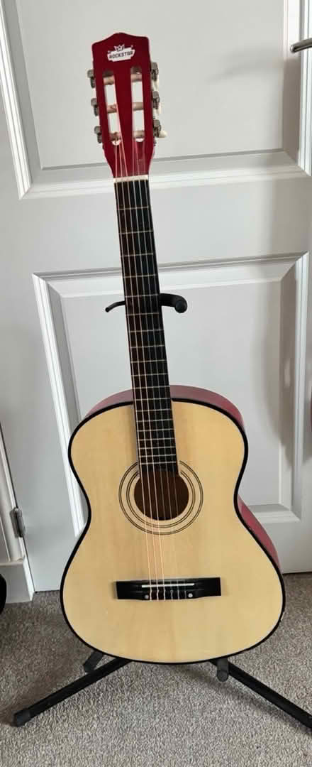 Photo of free Kids guitar with stand (East Kilbride) #2