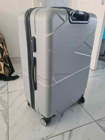 Photo of free Large hard shell suitcase (W5) #1