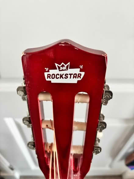 Photo of free Kids guitar with stand (East Kilbride) #1