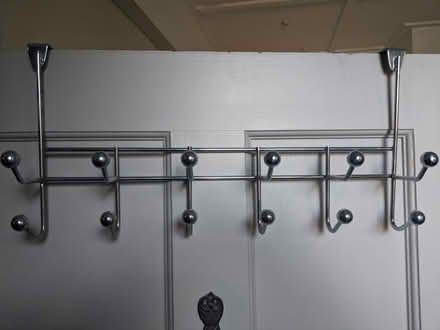 Photo of free 2 over door "chrome" hooks (sandycove recycle depot) #1