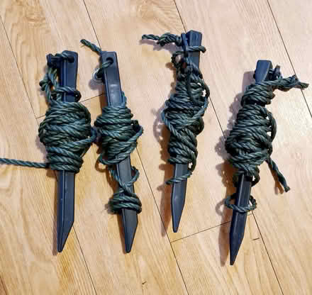 Photo of free Garden or camping ground pegs with cord x 4. (Panshanger AL7) #1