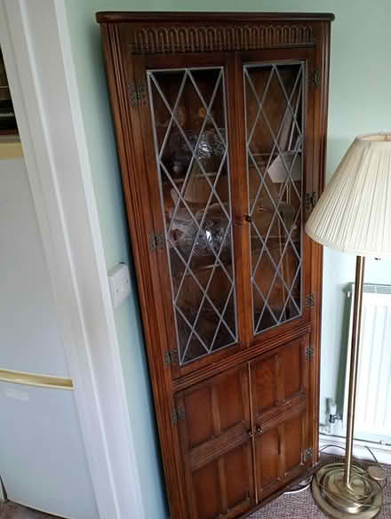 Photo of free Dark wood corner cabinet (Blewbury OX11) #1