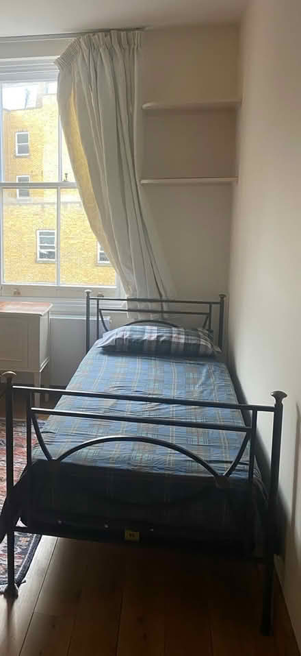Photo of free Cast iron single bed frame (SW5 0LA) #1