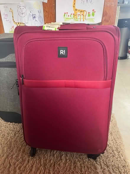 Photo of free Medium burgundy /pink suitcase (Coulsdon, nr, train station) #1