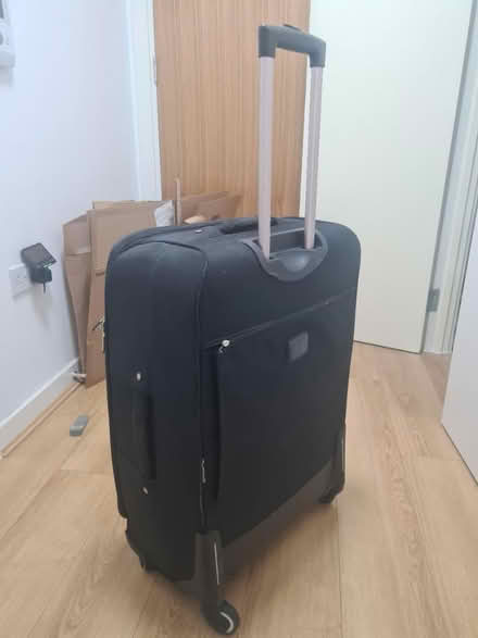 Photo of free Check-in suitcase (N42JP) #3