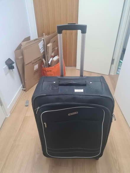 Photo of free Check-in suitcase (N42JP) #1
