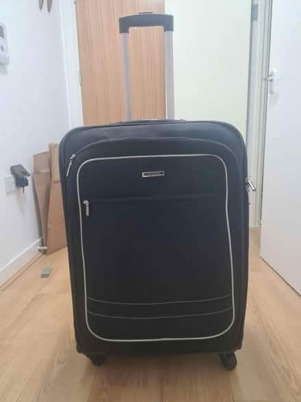 Photo of free Check-in suitcase (N42JP) #2