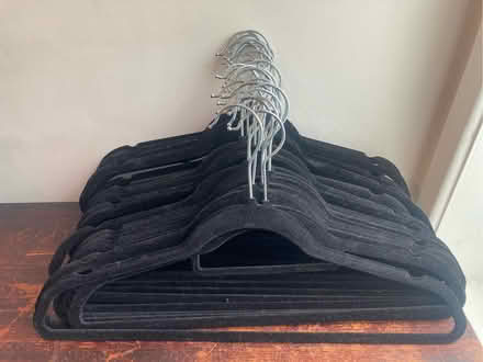Photo of free 30 x black slim black hangers (Levenshulme M19) #1