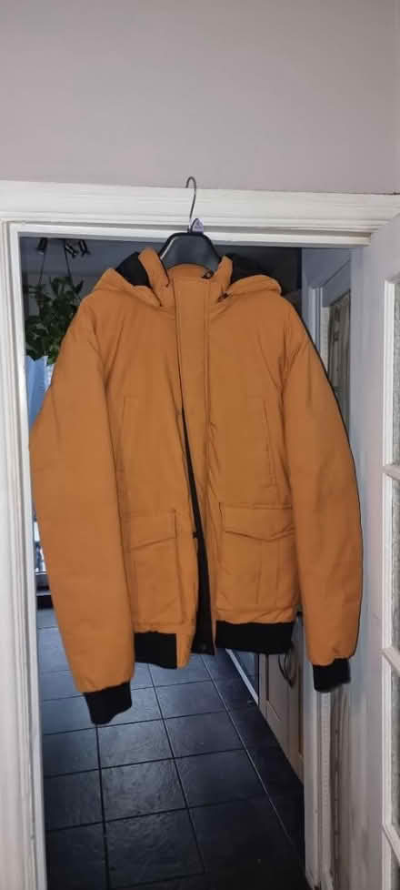 Photo of free Men's yellow coat (CR7) #1