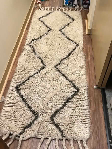 Photo of free 30" x 80" rug (Northgate) #1