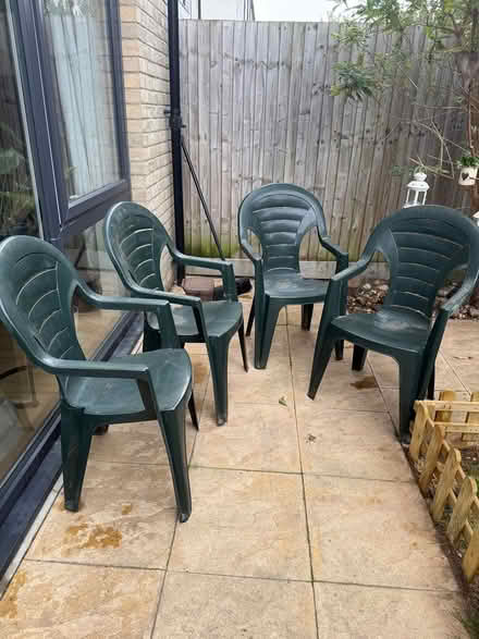 Photo of free 4 Green plastic garden chairs (Carshalton) #1