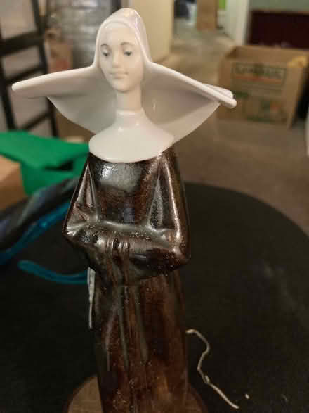 Photo of free Nun on wooden pedestal (Foothill Boulevard Cupertino) #1