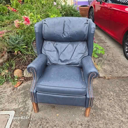Photo of free cool old navy blue leather chair (2630 Commanche St Santa Rosa) #1