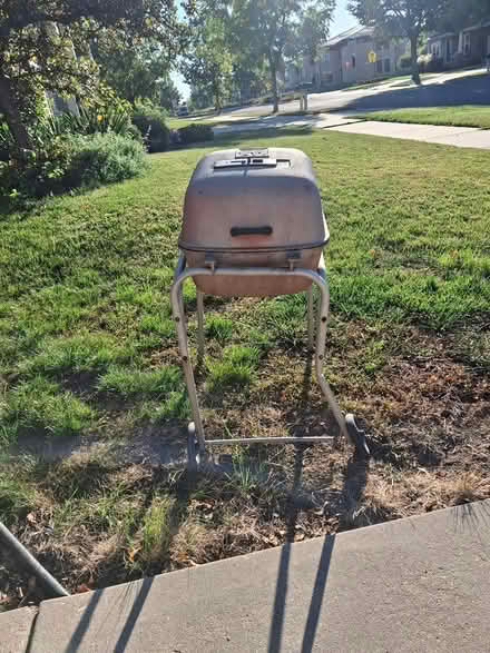 Photo of free Cast aluminum charcoal BBQ (9314 Ancient Oak Lane) #1