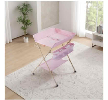 Photo of free Large Foldable changing table (SE18 6YG S SE18) #1
