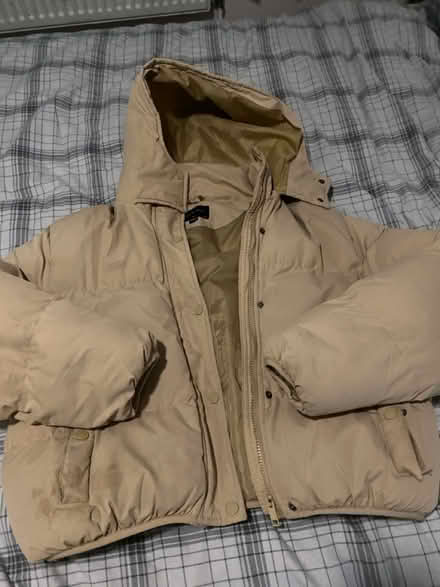 Photo of free Beige puffy jacket (SE12 lee) #1