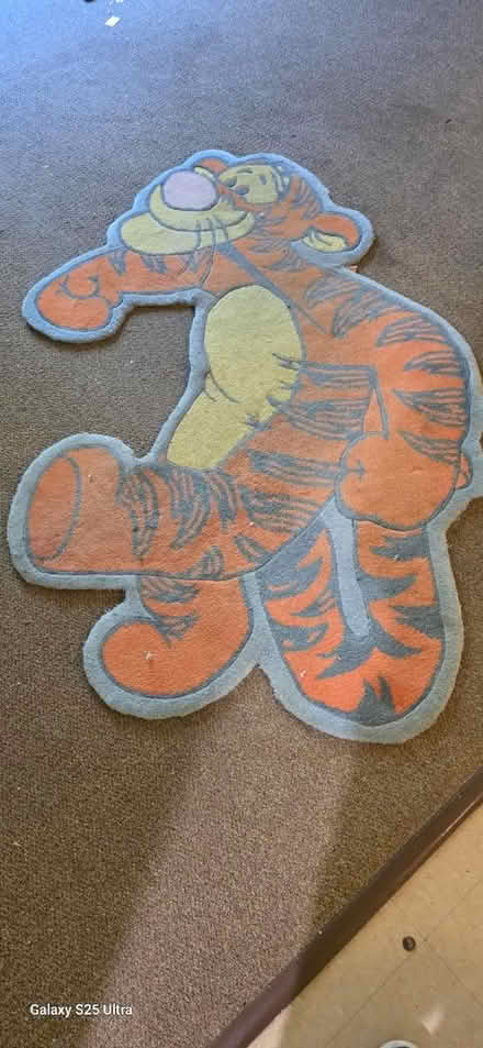 Photo of free Matching Tigger Clock & Rug (Near Downtown Ypsilanti) #1
