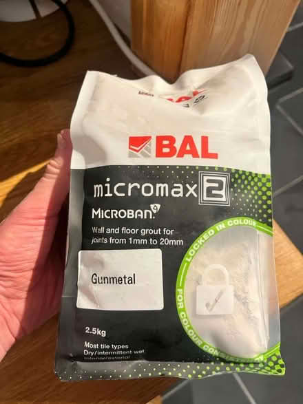 Photo of free One bag of unopened gunmetal grout (Fairfield LA1) #1