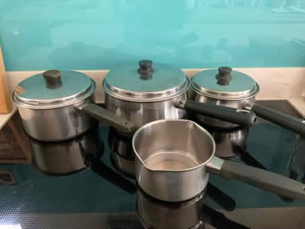 Photo of free 3 different sized pans and a milk pan. Non induction. (Cheadle Hulme SK7) #1